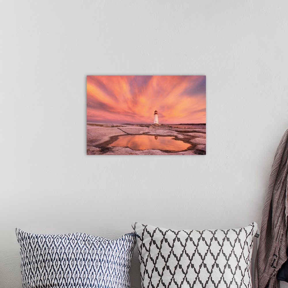 A bohemian room featuring Dramatic sunrise at Peggy's Cove Lighthouse heralds in approaching storm,  Nova Scotia