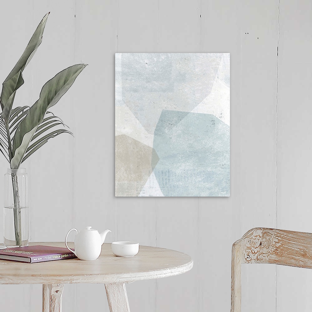A farmhouse room featuring Abstract painting with overlapping shapes in muted blue, white, and grey hues.