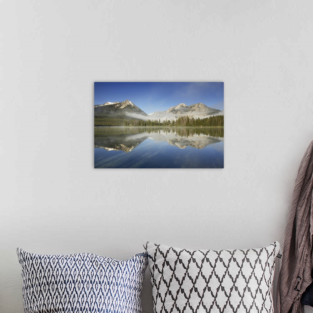 A bohemian room featuring Photograph of Petit Lake in clearing morning fog, Sawtooth National Recreation Area Idaho