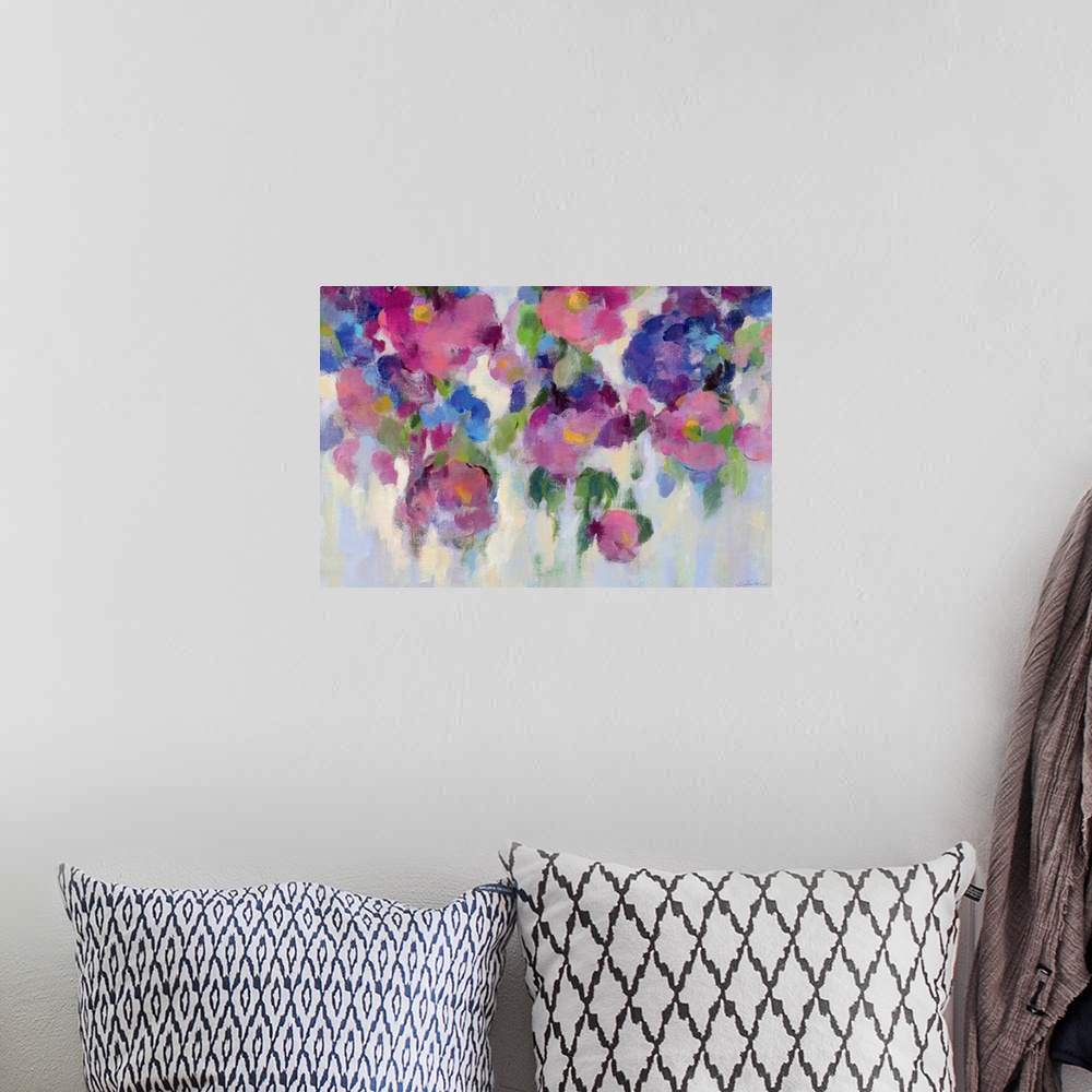 A bohemian room featuring Contemporary painting of blue and pink flowers.