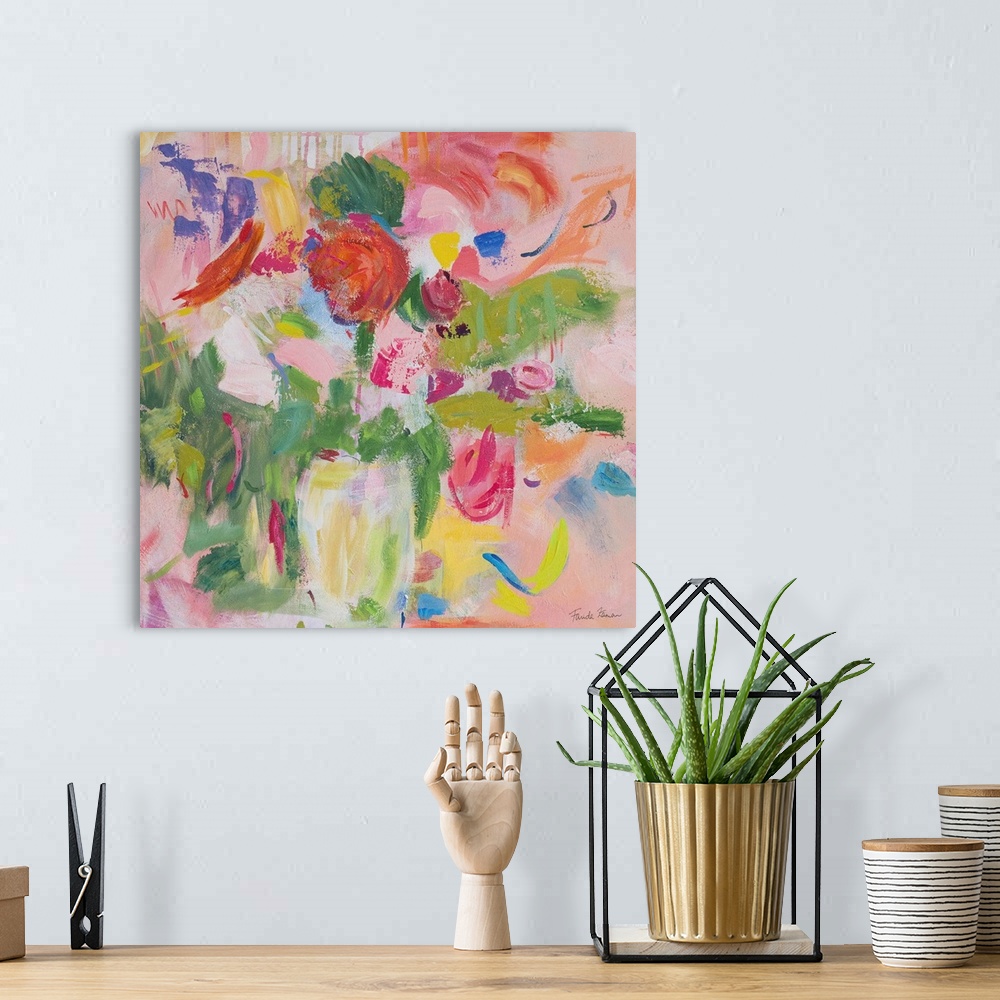 A bohemian room featuring A square modern painting of bright colorful flowers in shades of pink, in a vase.