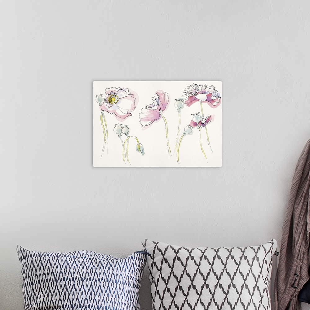 A bohemian room featuring Watercolor painting of soft pink flowers in different positions against a neutral toned background.