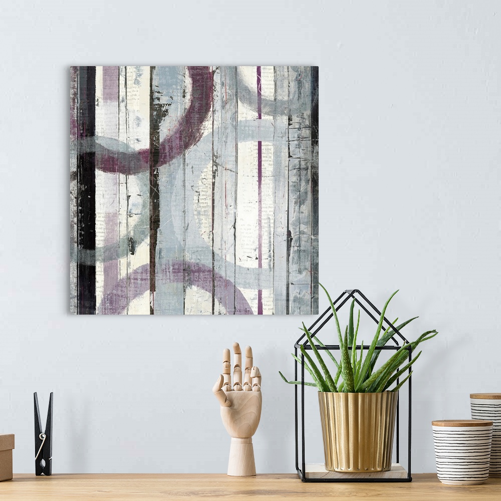 A bohemian room featuring Contemporary abstract image of vertical wooden planks with overlaying circles that overlap.