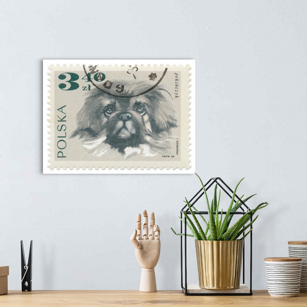 A bohemian room featuring Artwork of a Polish postage stamp of a pekingese with a black postmark overlapping.