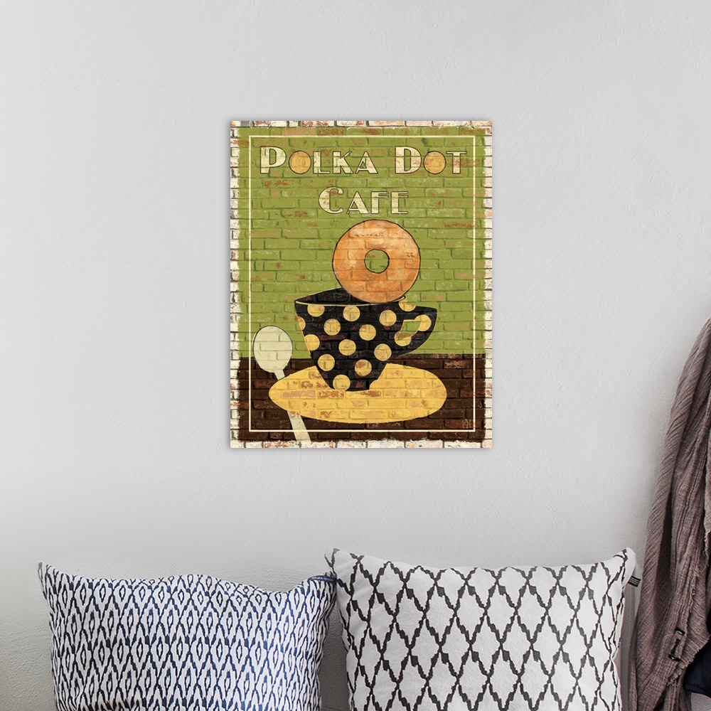 A bohemian room featuring Portrait, large artwork for the "Polka Dot Cafo", of a donut sitting on the edge of a polka dotte...
