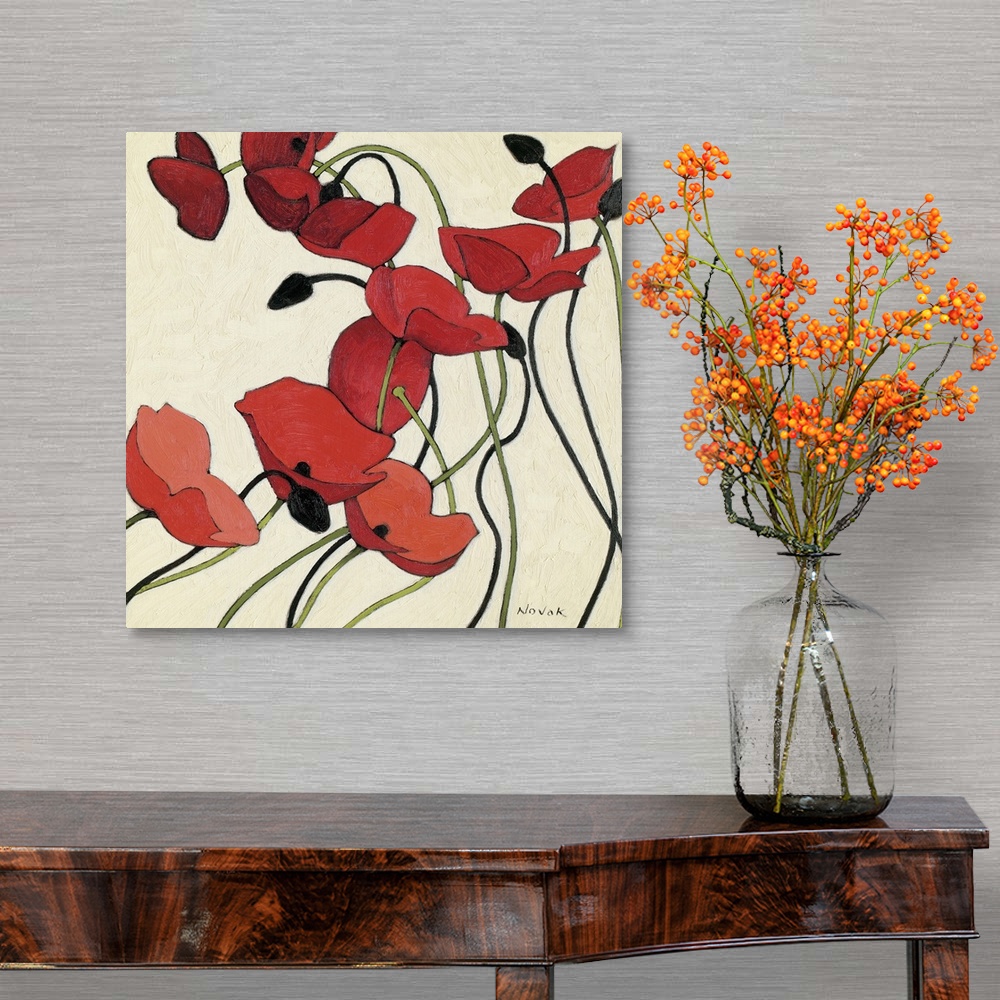 A traditional room featuring Contemporary artwork of red poppies on long thin stems that are painted on a neutral background.