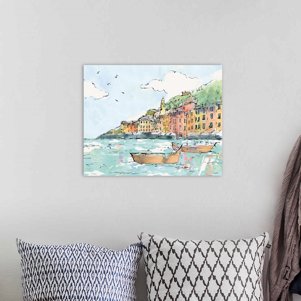 A bohemian room featuring A watercolor cityscape painting of Portofino, Italy.