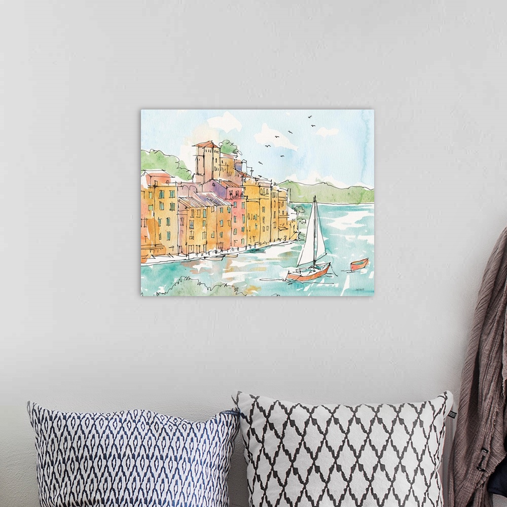 A bohemian room featuring A watercolor cityscape painting of Portofino, Italy.