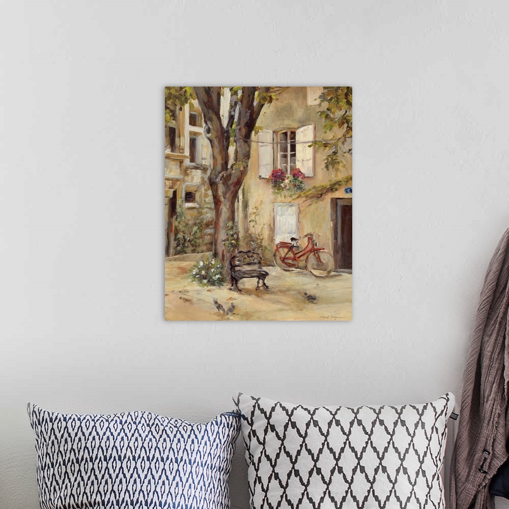 A bohemian room featuring Painting of building courtyard with huge tree growing in center.  The building is covered with wi...