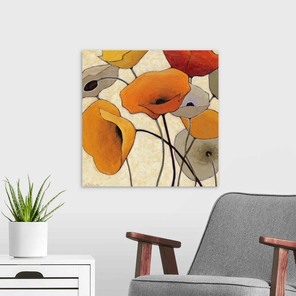 A modern room featuring Abstract painting of warm colored flowers with long thin stems.