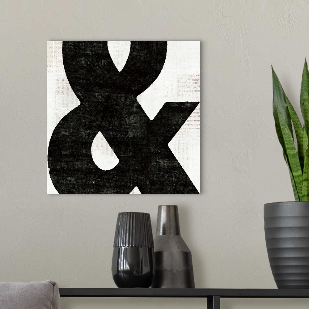 A modern room featuring Contemporary painting of an ampersand close-up in the frame of the image.