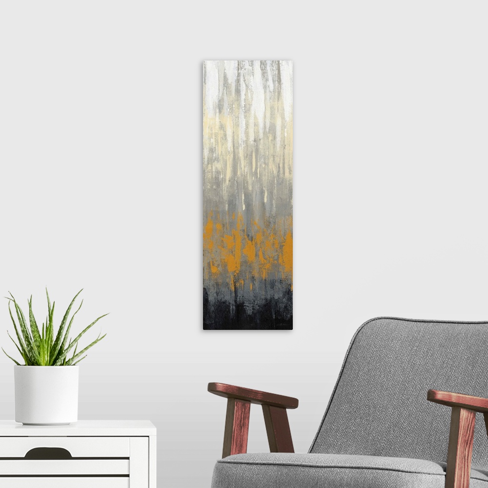 A modern room featuring A long, narrow vertical abstract of textured gradient tones of grey, orange and black.