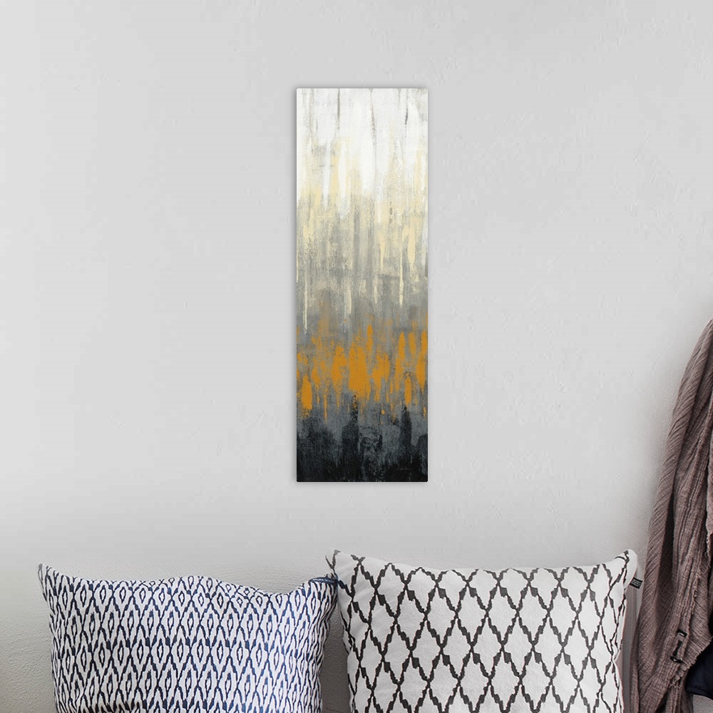 A bohemian room featuring A long, narrow vertical abstract of textured gradient tones of grey, orange and black.