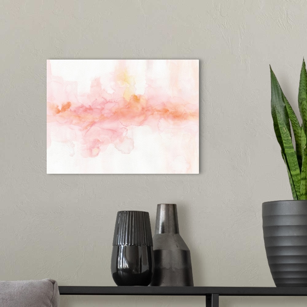A modern room featuring Soft abstract painting in pink, yellow, and orange hues.