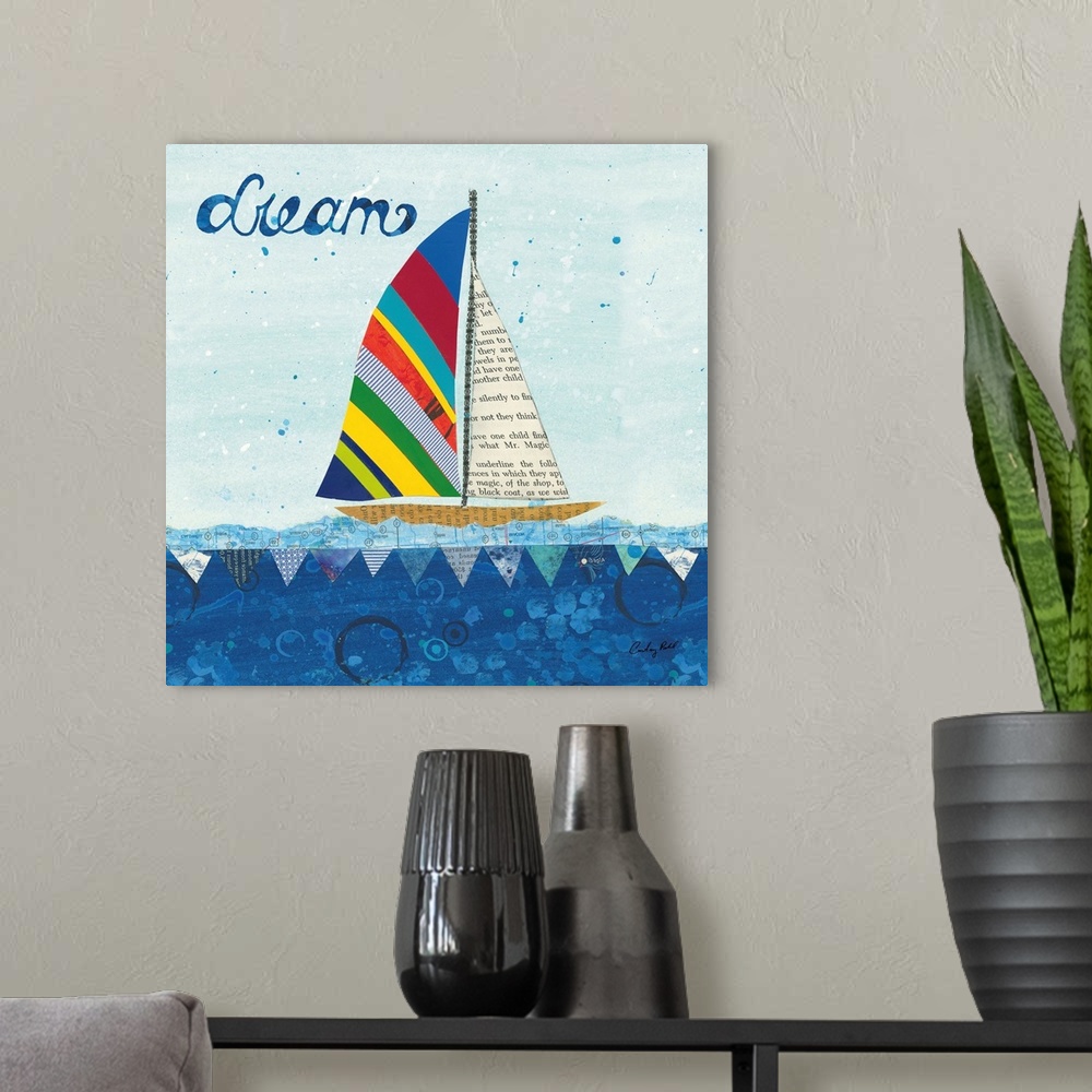 A modern room featuring Decorative collage artwork featuring a whimsical sailboat floating on the sea with the word, 'Dre...