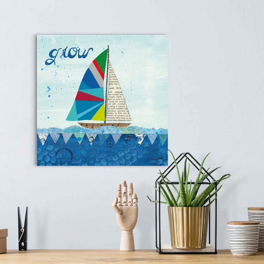 A bohemian room featuring Decorative collage artwork featuring a whimsical sailboat floating on the sea with the word, 'Gro...