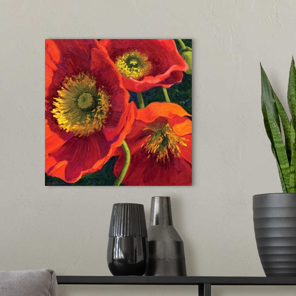 A modern room featuring Painting of three poppy flowers up close in the sun.
