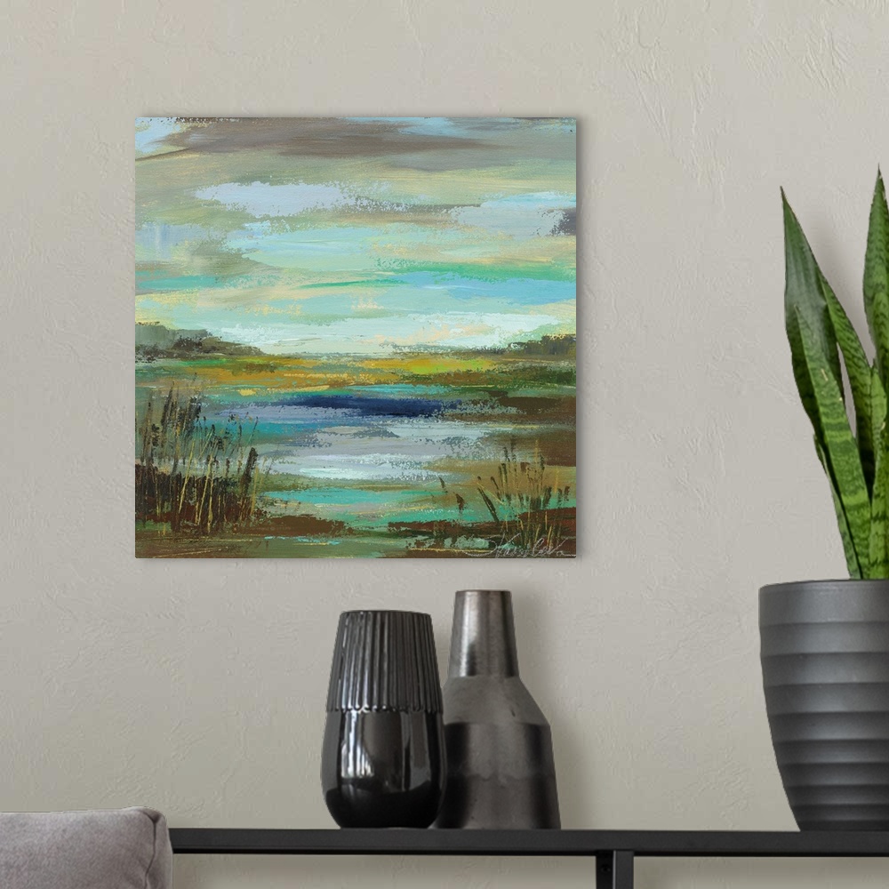 A modern room featuring Contemporary landscape painting of the edge of a lake with reeds and a gloomy sky.