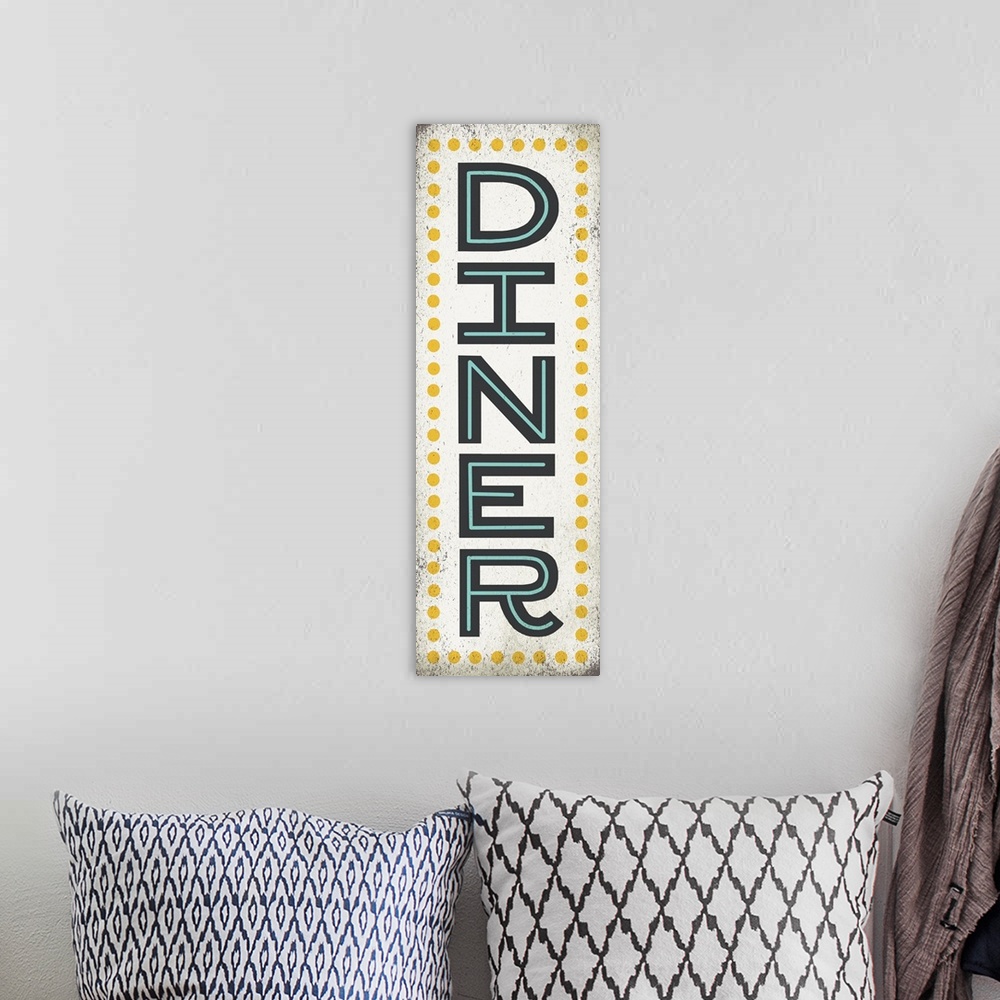 A bohemian room featuring Retro style sign for a diner with large letters.