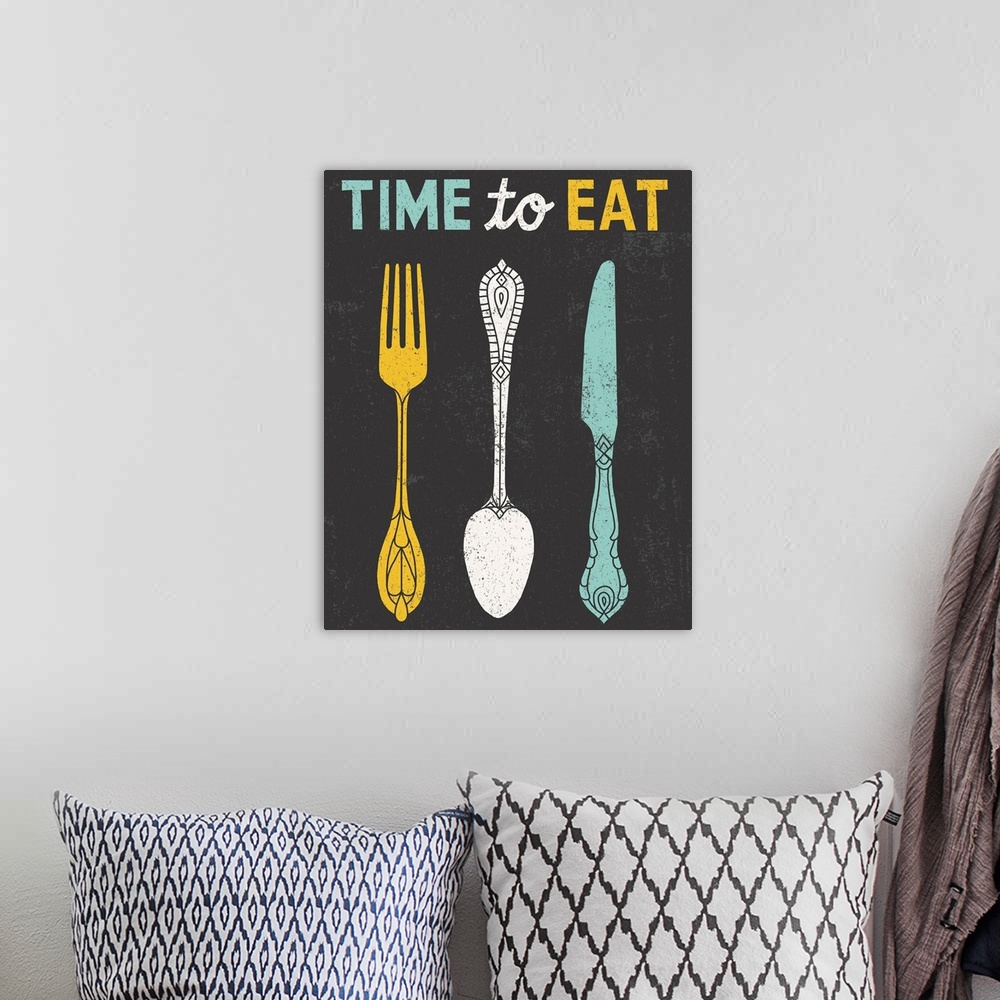 A bohemian room featuring Retro style diner poster with a fork, spoon, and knife.