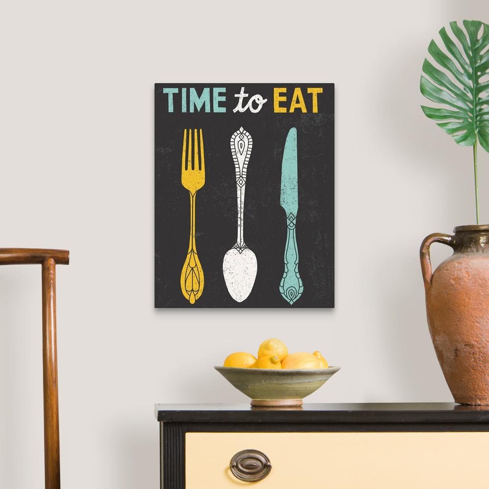 A traditional room featuring Retro style diner poster with a fork, spoon, and knife.