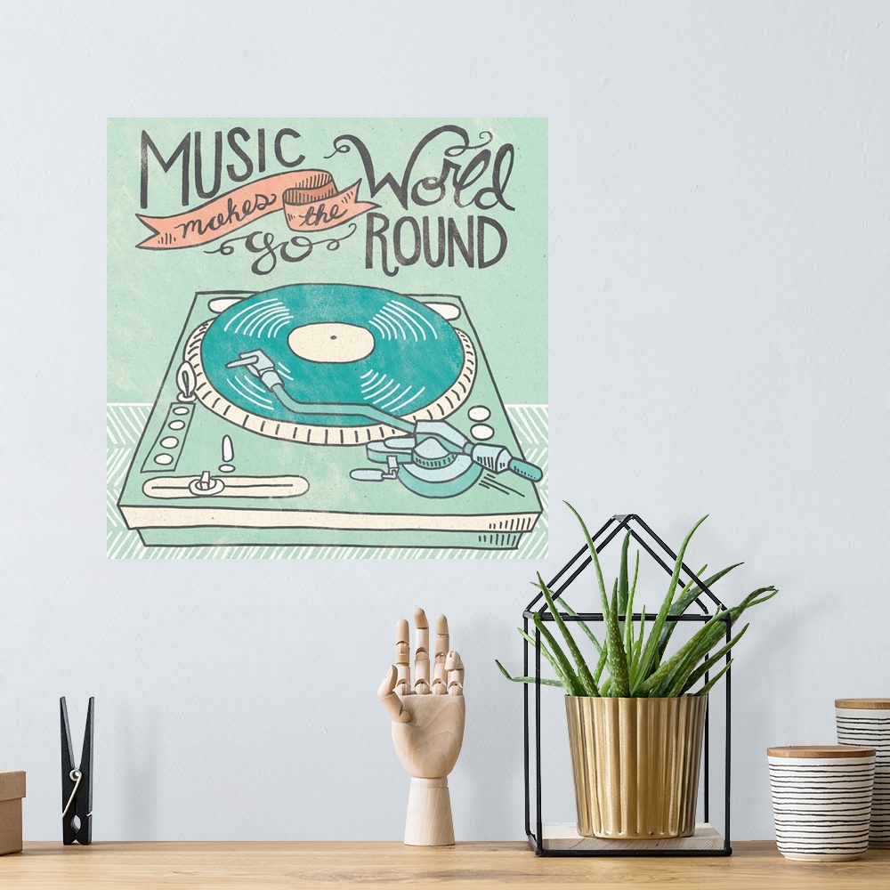 A bohemian room featuring Retro style artwork of a record player with a sweet hand-lettered sentiment.