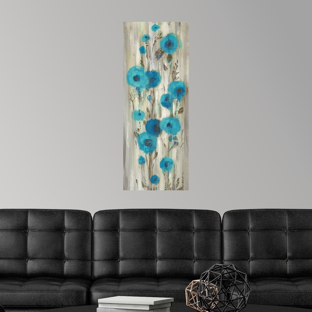 A modern room featuring Contemporary artwork of abstract blue flowers over cascading gray color.
