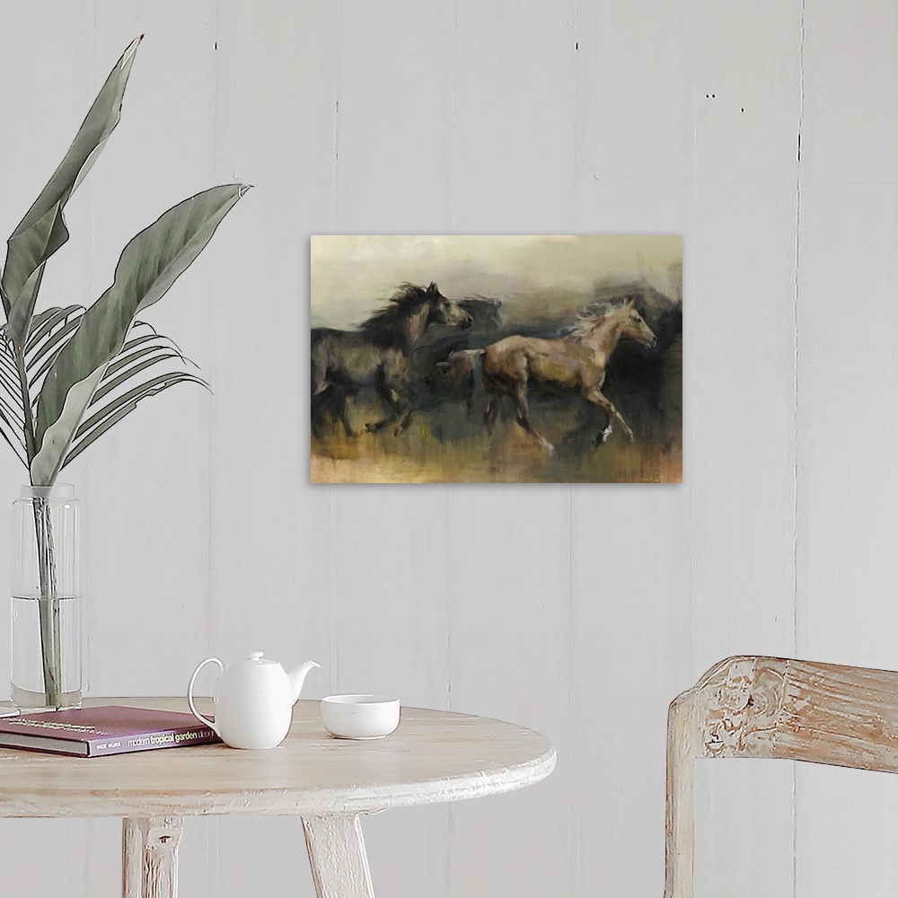 A farmhouse room featuring Contemporary painting of a black and a brown horse galloping in the western desert.
