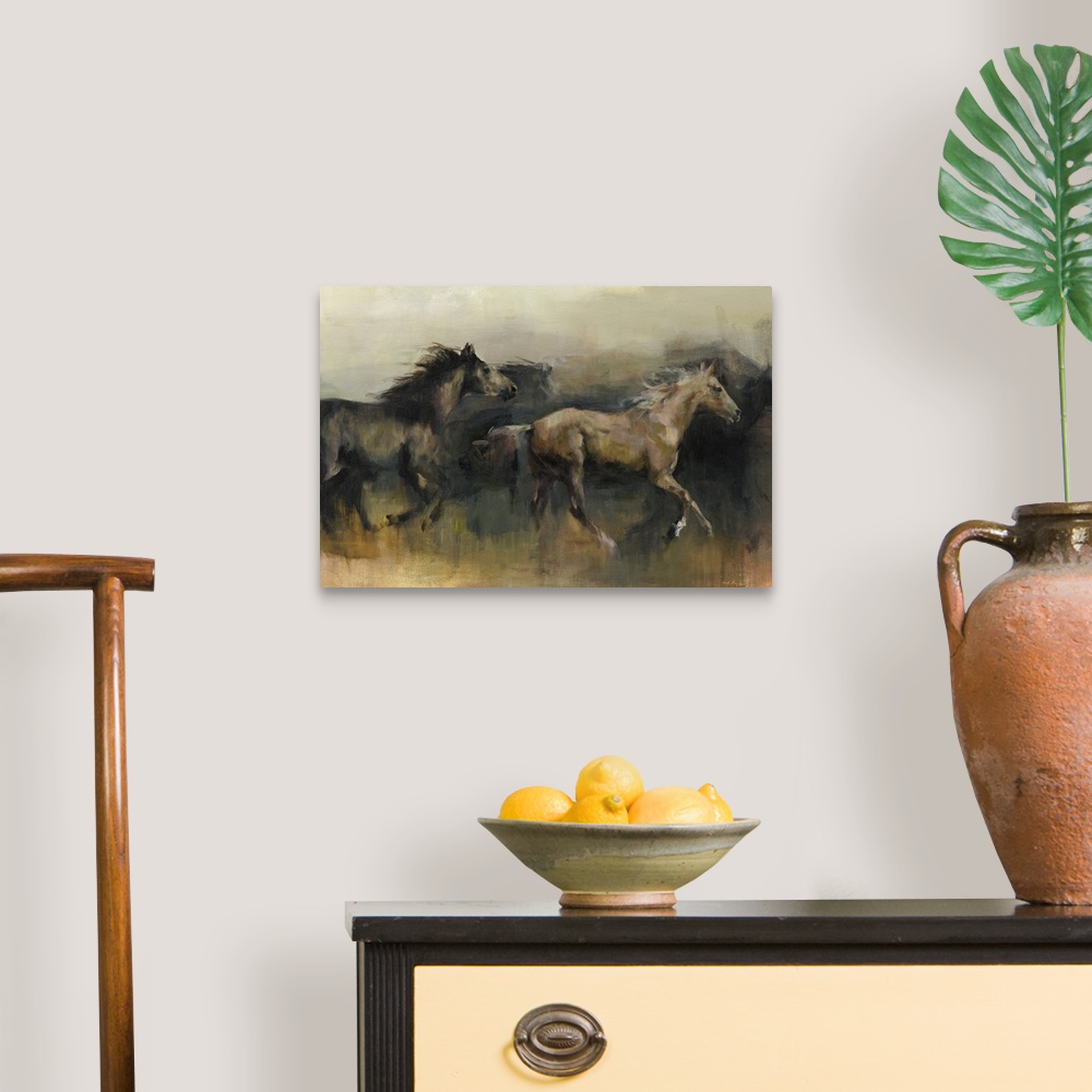 A traditional room featuring Contemporary painting of a black and a brown horse galloping in the western desert.