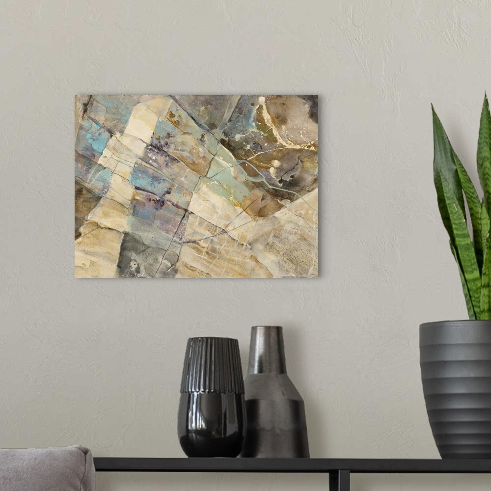 A modern room featuring Large abstract painting with brown, gray, cream, and blue hues resembling a rocky canyon with sma...