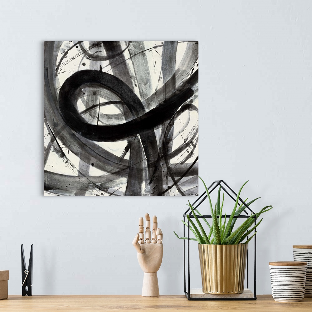A bohemian room featuring Contemporary abstract painting of black semi-transparent strokes against a white background.