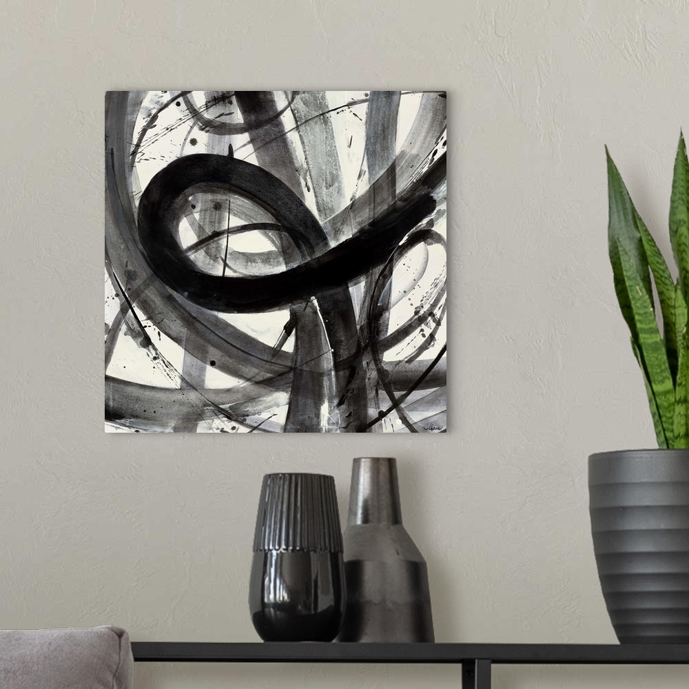 A modern room featuring Contemporary abstract painting of black semi-transparent strokes against a white background.