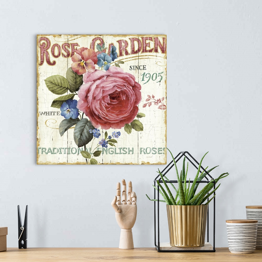 A bohemian room featuring Square painting on canvas of a rose and other flowers in the middle with text around it on a grun...