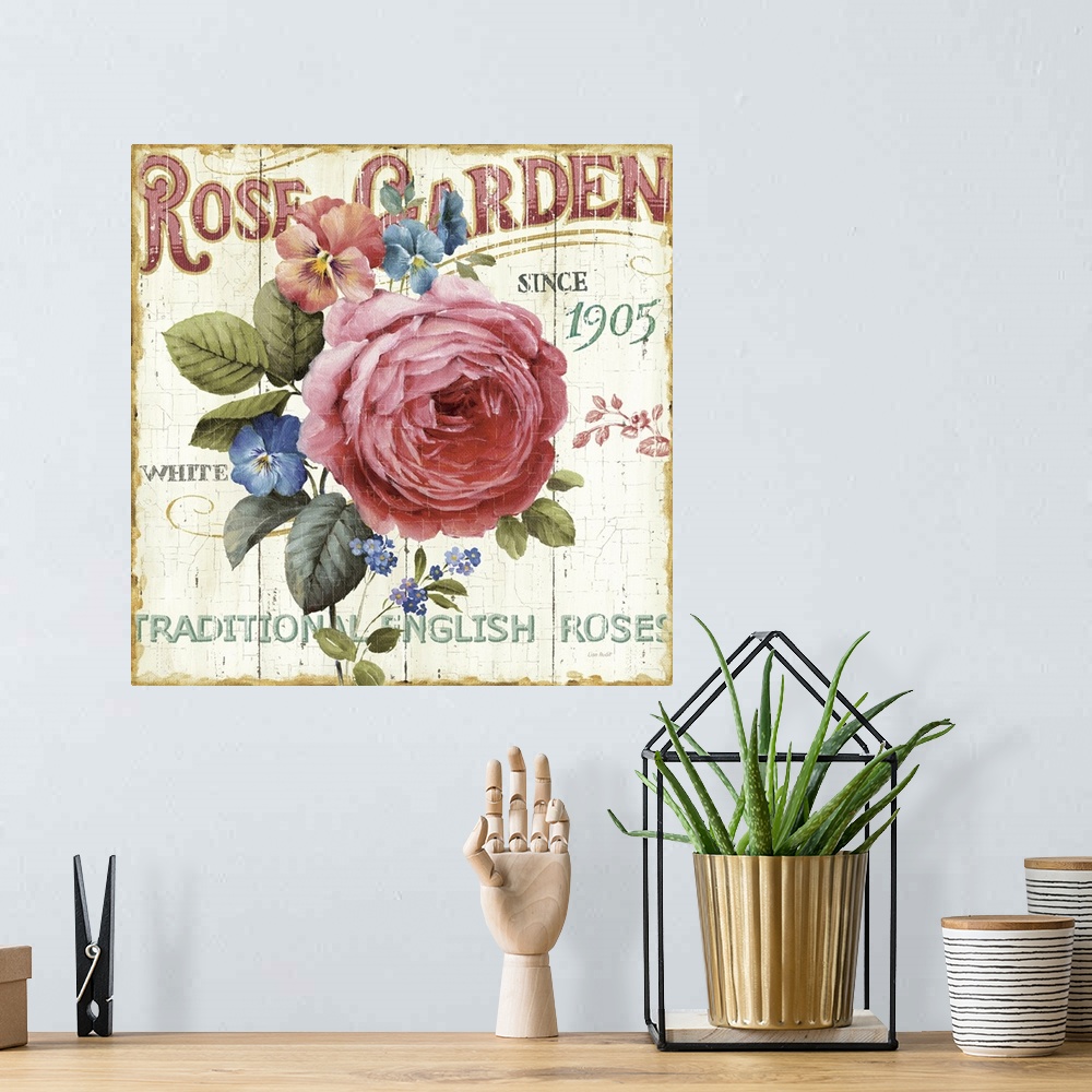 A bohemian room featuring Square painting on canvas of a rose and other flowers in the middle with text around it on a grun...