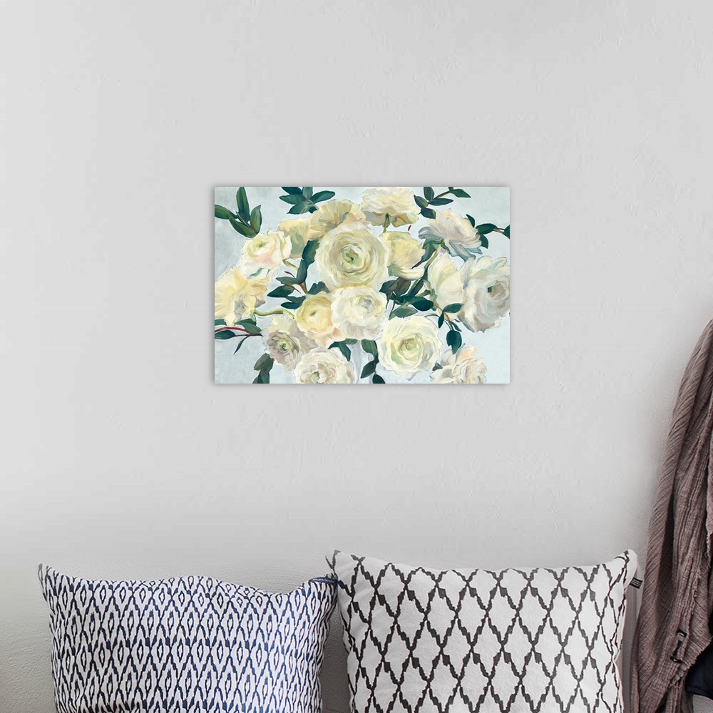 A bohemian room featuring A large contemporary painting of a full bloomed yellow roses against of light blue backdrop.