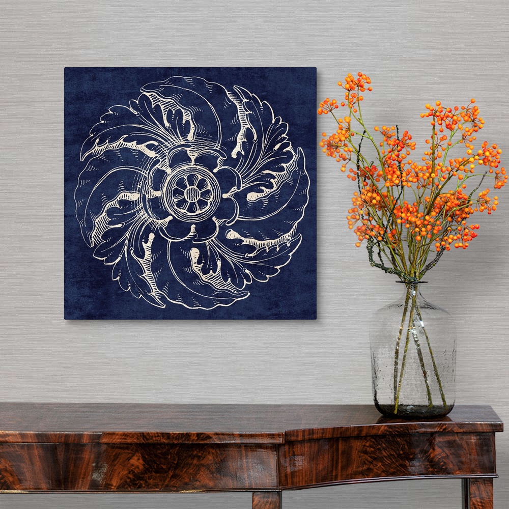 A traditional room featuring Contemporary artwork of a vintage stylized rosette in dark blue.