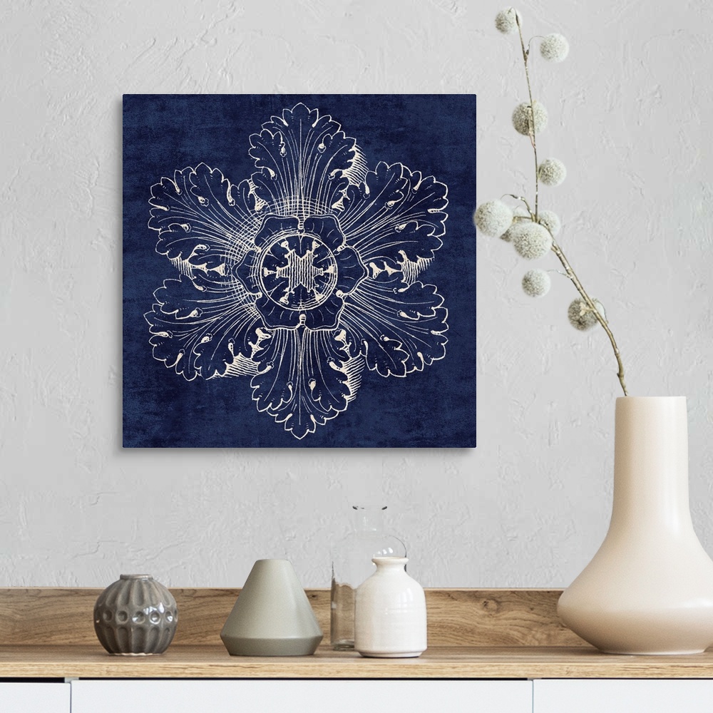 A farmhouse room featuring Contemporary artwork of a vintage stylized rosette in dark blue.