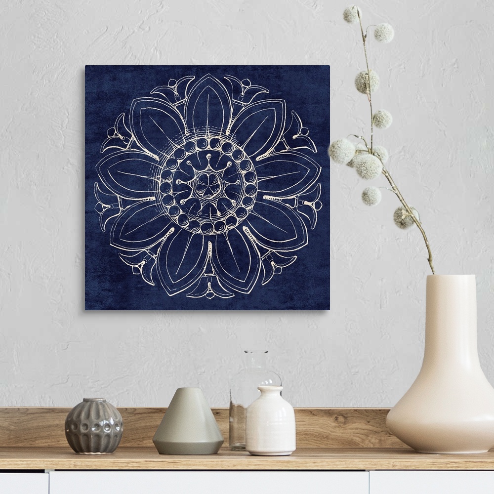A farmhouse room featuring Contemporary artwork of a vintage stylized rosette in dark blue.