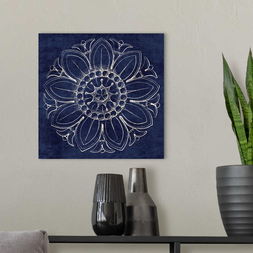 A modern room featuring Contemporary artwork of a vintage stylized rosette in dark blue.