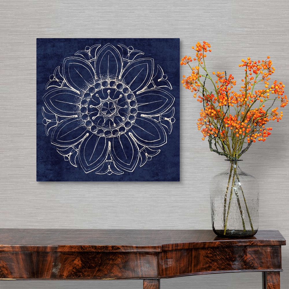 A traditional room featuring Contemporary artwork of a vintage stylized rosette in dark blue.