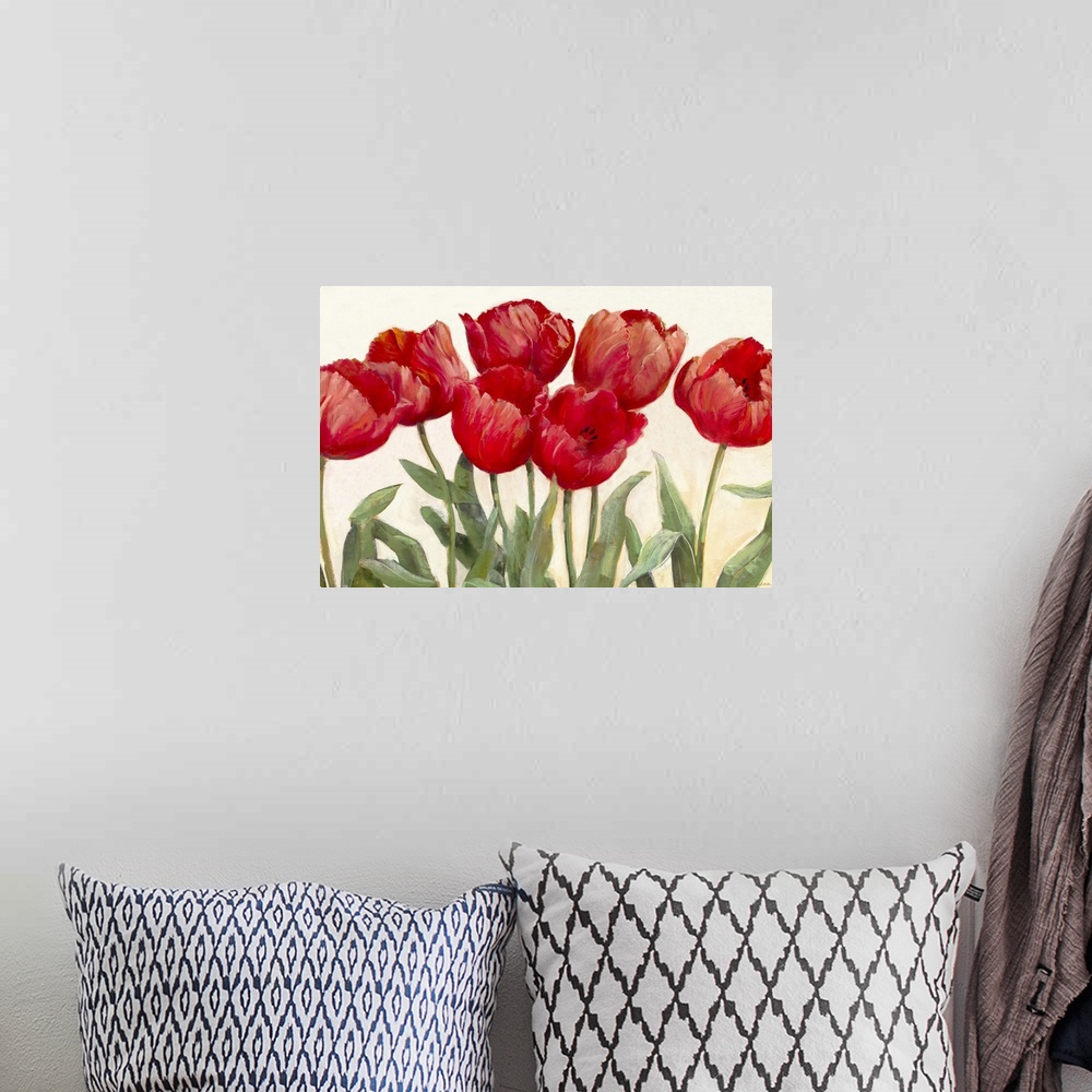 A bohemian room featuring Large floral art focuses on seven flowers as they sit against a bare background.