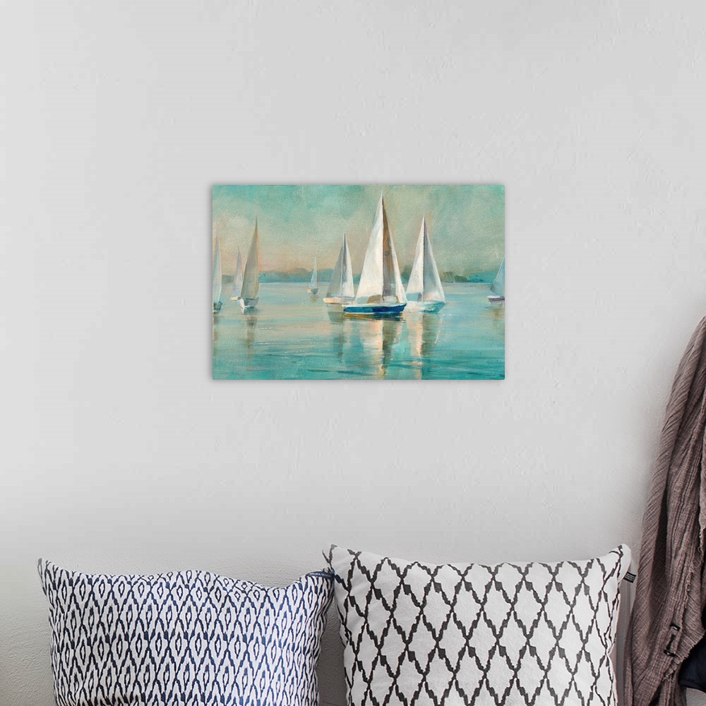 A bohemian room featuring Contemporary painting of sailboats on crystal blue waters.