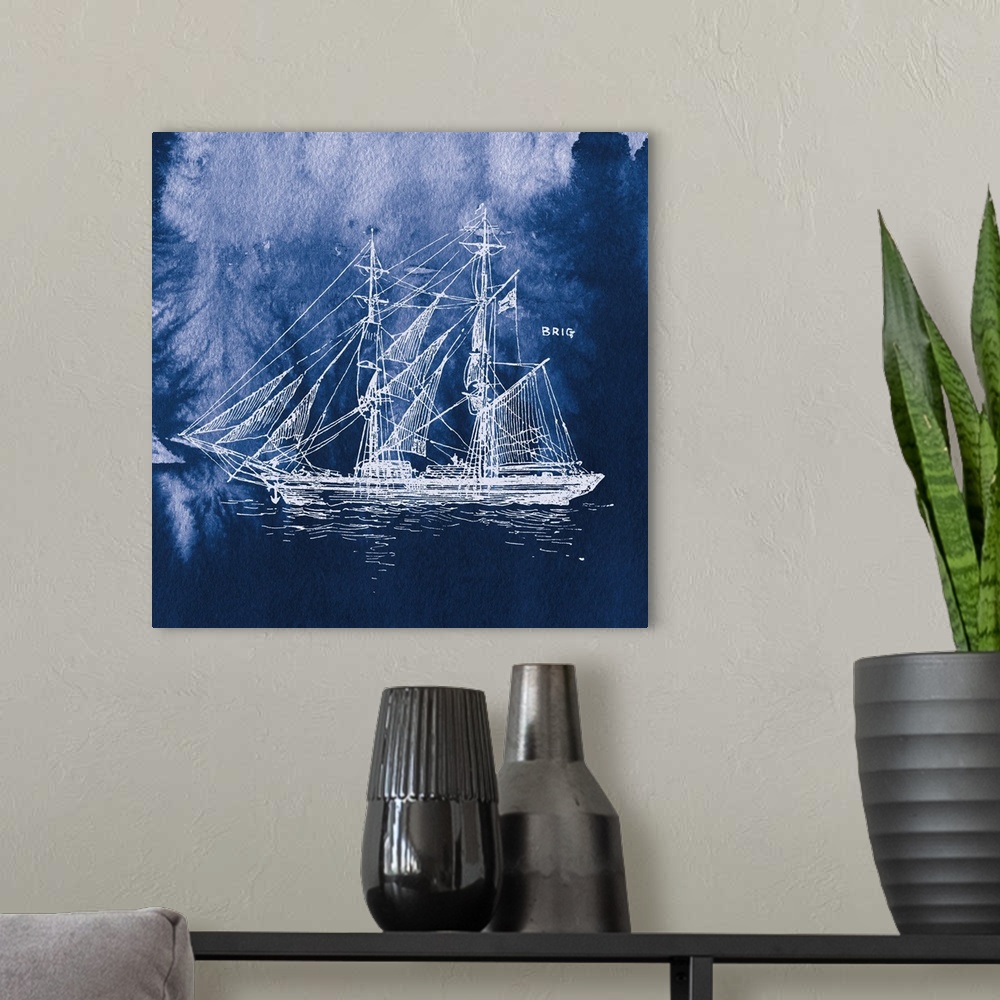 A modern room featuring Square art with a white silhouette of a sailboat on an indigo watercolor background and "Brig" wr...