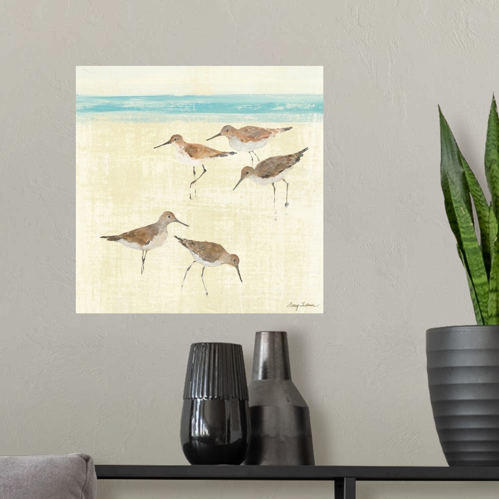 A modern room featuring Square painting of ocean birds walking on the sand of a beach with the sea in the distance.