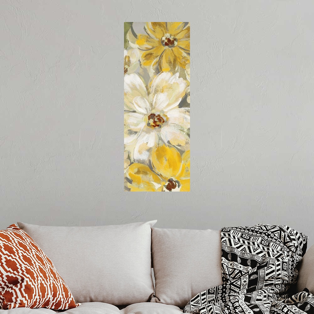 A bohemian room featuring A long vertical image of large yellow flower blooms with white accents.
