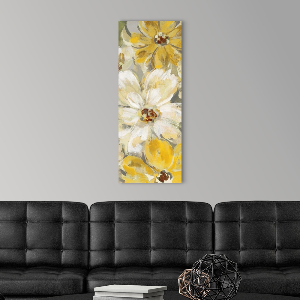 A modern room featuring A long vertical image of large yellow flower blooms with white accents.
