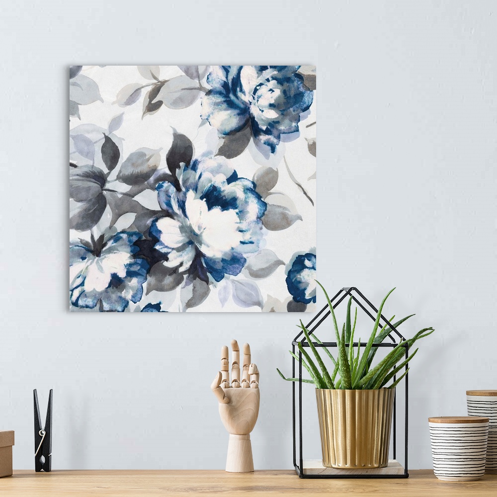 A bohemian room featuring Artwork of roses in shades of deep blue and grey.