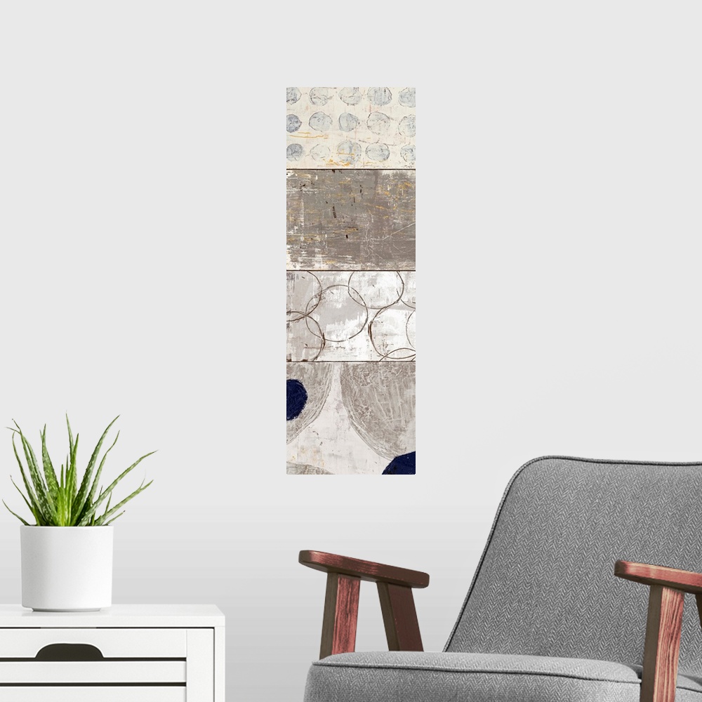 A modern room featuring Vertical panoramic painting of four squares stacked on top of each other.  Each square is filled ...