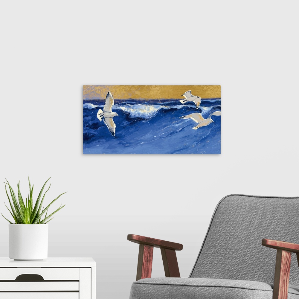 A modern room featuring A contemporary painting of seagulls in flight over a choppy blue sea.