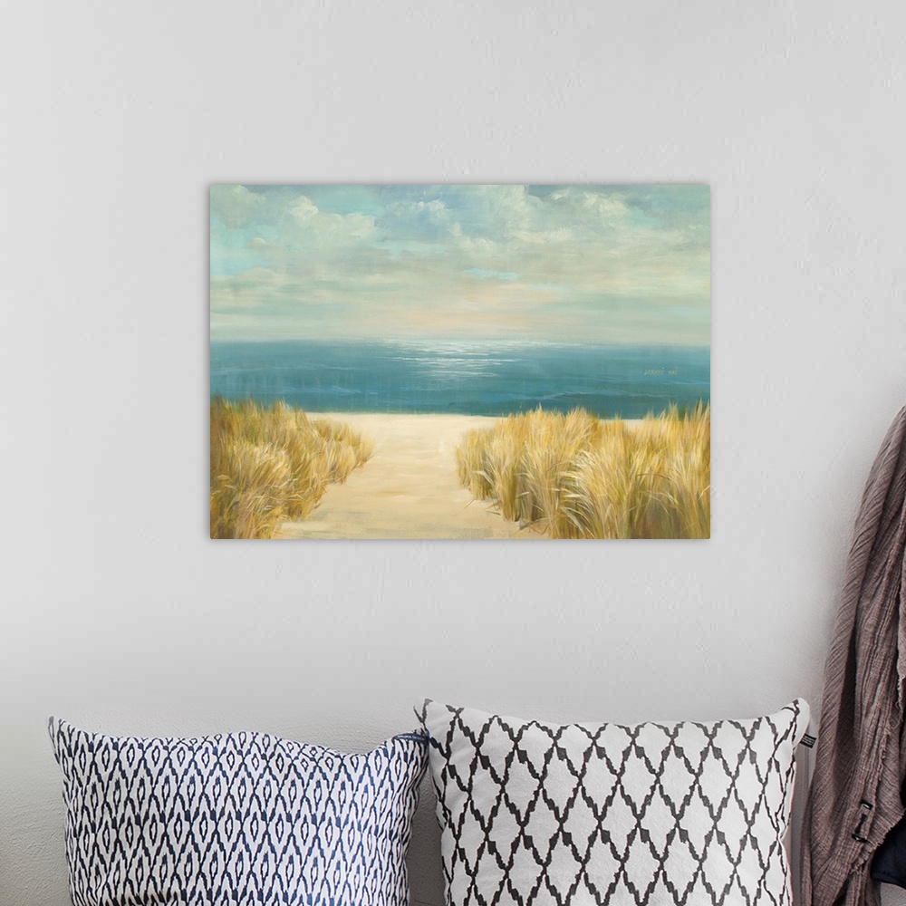 A bohemian room featuring Contemporary seascape painting of a sandy beach with grasses at the edge of the ocean.